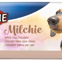 Pies może jeść białą czekoladę "Milchie" od Trixie. Opakowanie z pieskiem jamnikiem i informacją o produkcie.