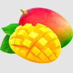 Soczyste mango, pokrojone w kostkę, obok całego owocu. Czy pies może mango? To pytanie nurtuje wielu właścicieli czworonogów.